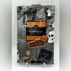 Haunted Halloween Flannel Backed Vinyl Tablecloth Gray Book of Spells 60" Round